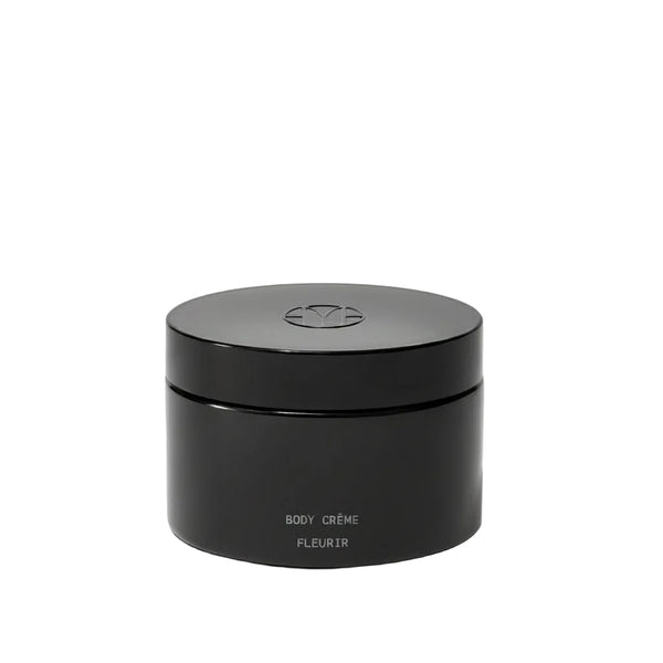 Black jar labeled 'BODY CREME FLEURIR' on a white background