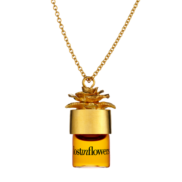 strangelove - lostinflowers - potion pendant